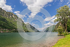 Deep panoramic view of the western shore of Lombardean highest prealpine lake - Lago Idro.Â Brescia, Lombardy, Italy